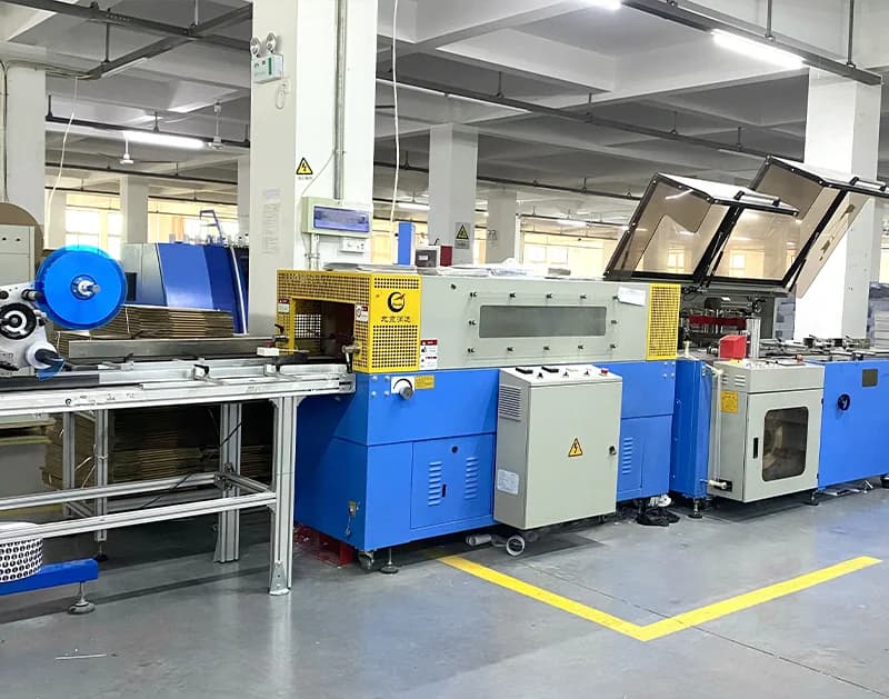 Fully automatic heat shrink wrapping machine
